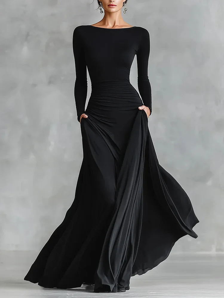 Modern long black crepe dress with pleated boat neckline